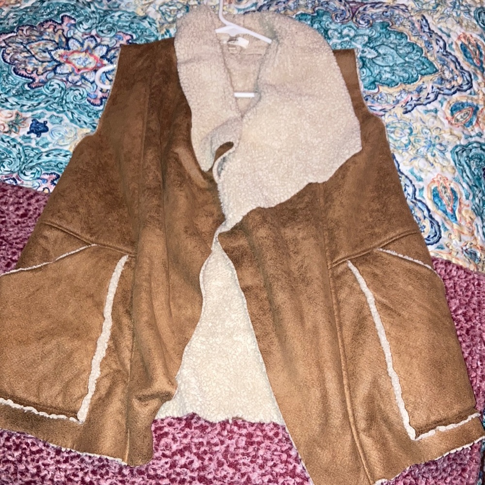 Brown floral with white fur in the inside